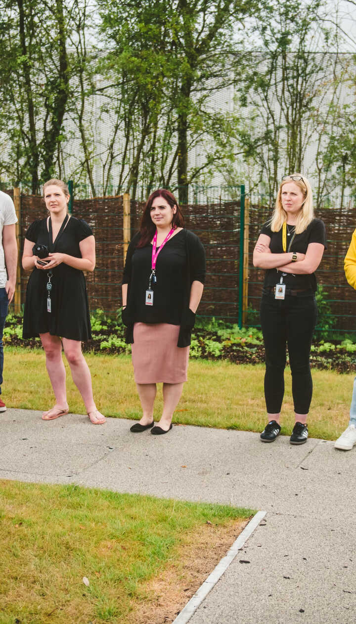 group receiving instructions for a bespoke escape challenge