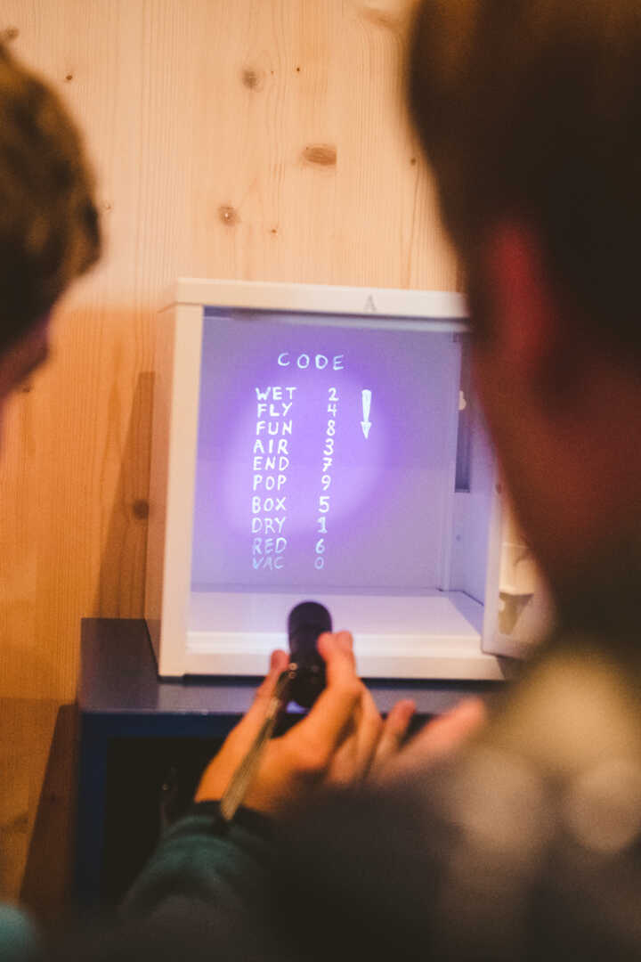 group receiving instructions for a bespoke escape challenge